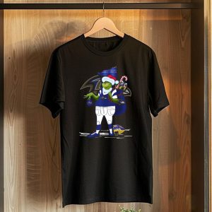 Grinch Santa Holding Candy Cane Bag and Baltimore Ravens Football in Ravens T-Shirt