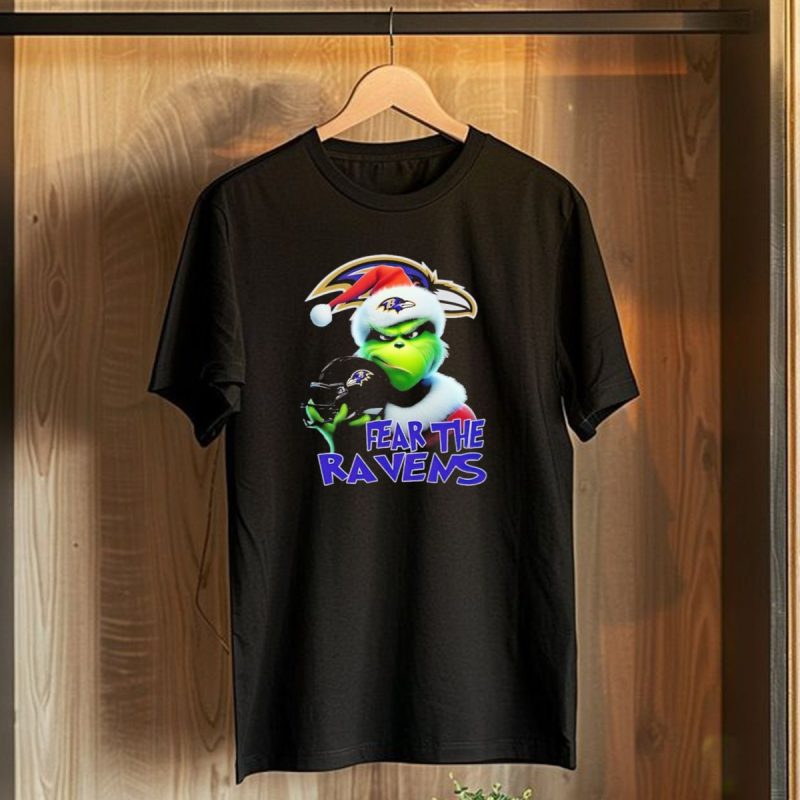Grinch Wearing Santa Hat Holding Baltimore Ravens Helmet Fear The Ravens T Shirt 1 T Shirt 1