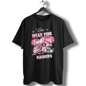 In October We Wear Pink And Watch Raiders Las Vegas Football Pumpkins Helmet 509 L1Ptt T-Shirt