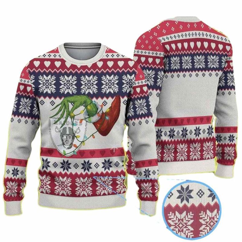 Las Vegas Raiders Snowflake And Heart Patterns Featuring Grinch Hand Holding Logo Ugly Sweater 1